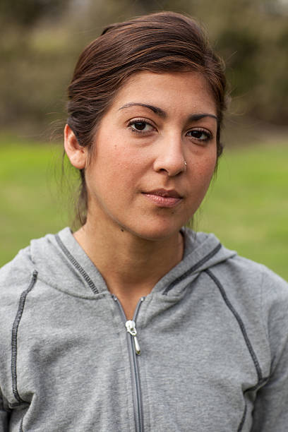Athletic young Hispanic woman in workout clothing