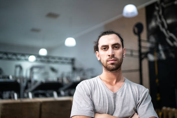 Portrait of a young man in a gym